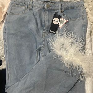 Light wash straight jean with feather bottom